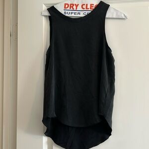 Black tank with beautiful back. Size XS. Never worn.